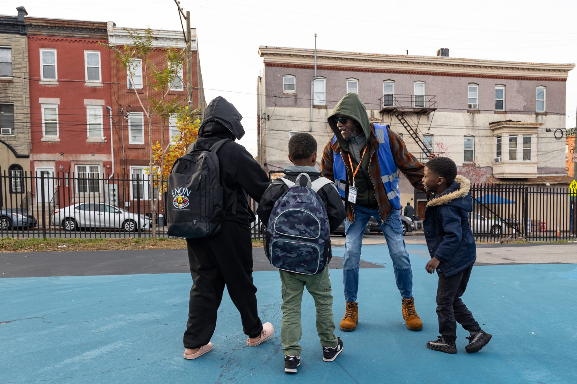 Saleem Gilliard greets students on the schoolyard