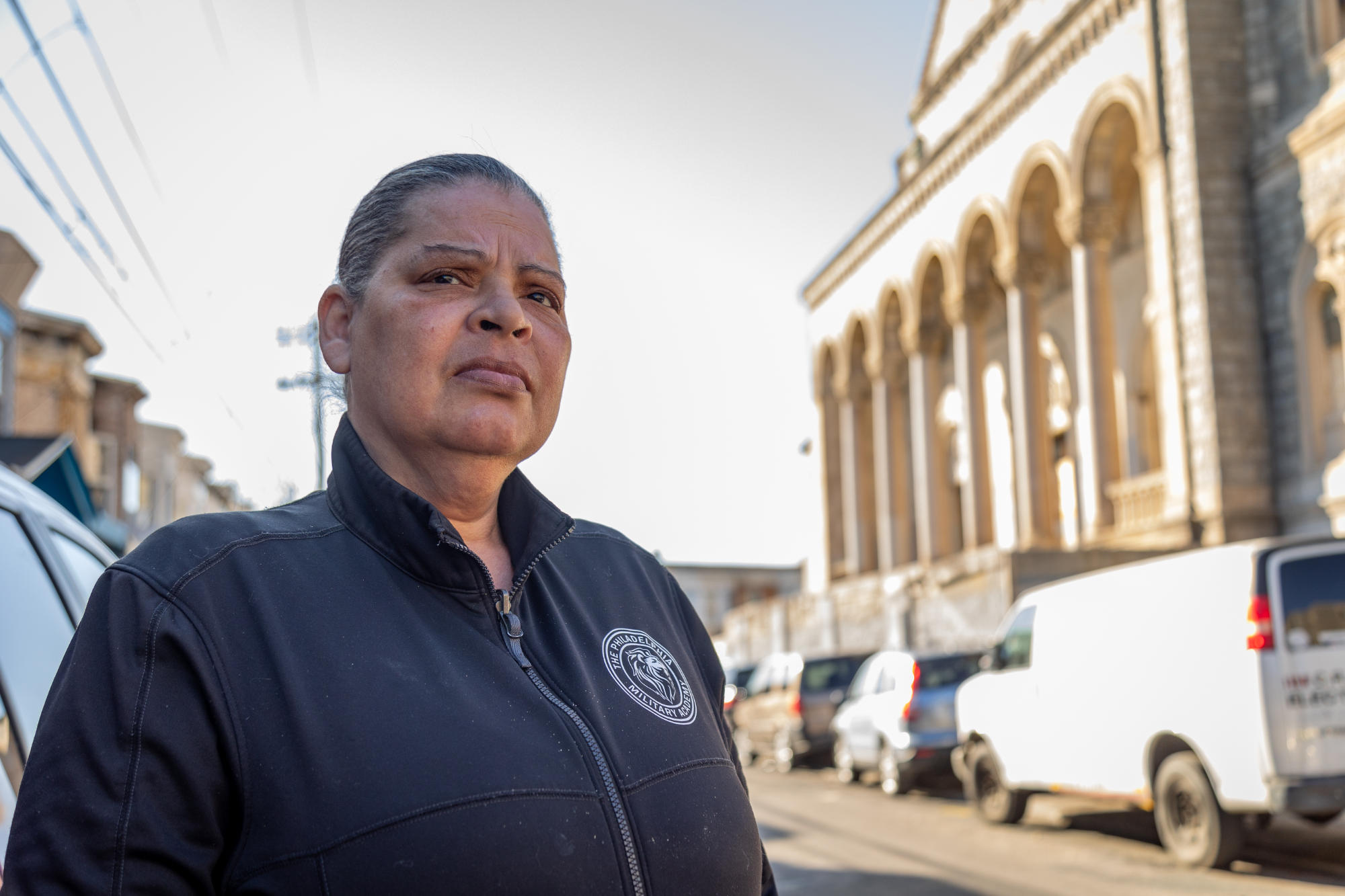 Arlene Ortiz poses for a portrait outside her home in Kensington