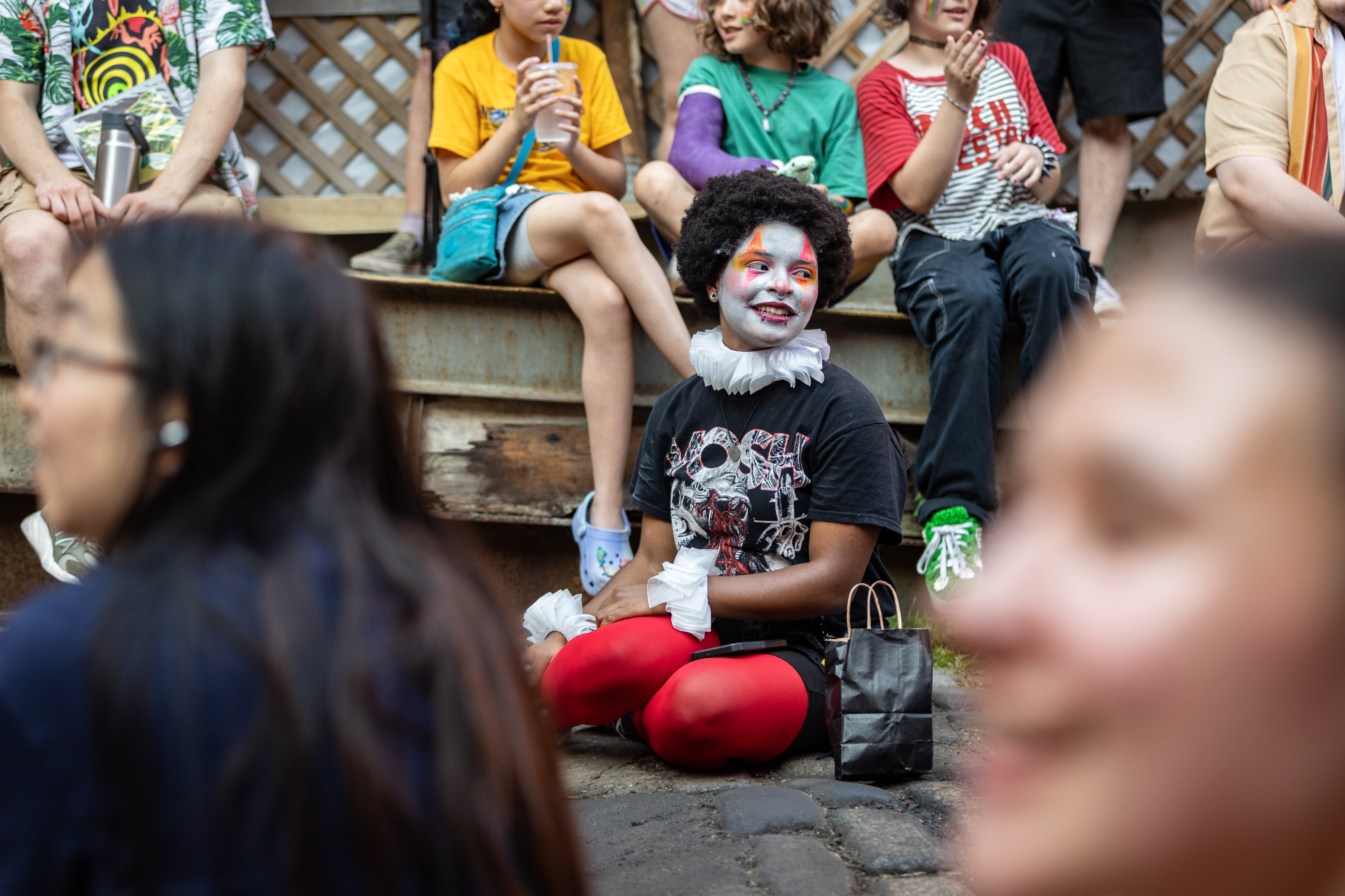 Performer in clown makeup at Queer Circus