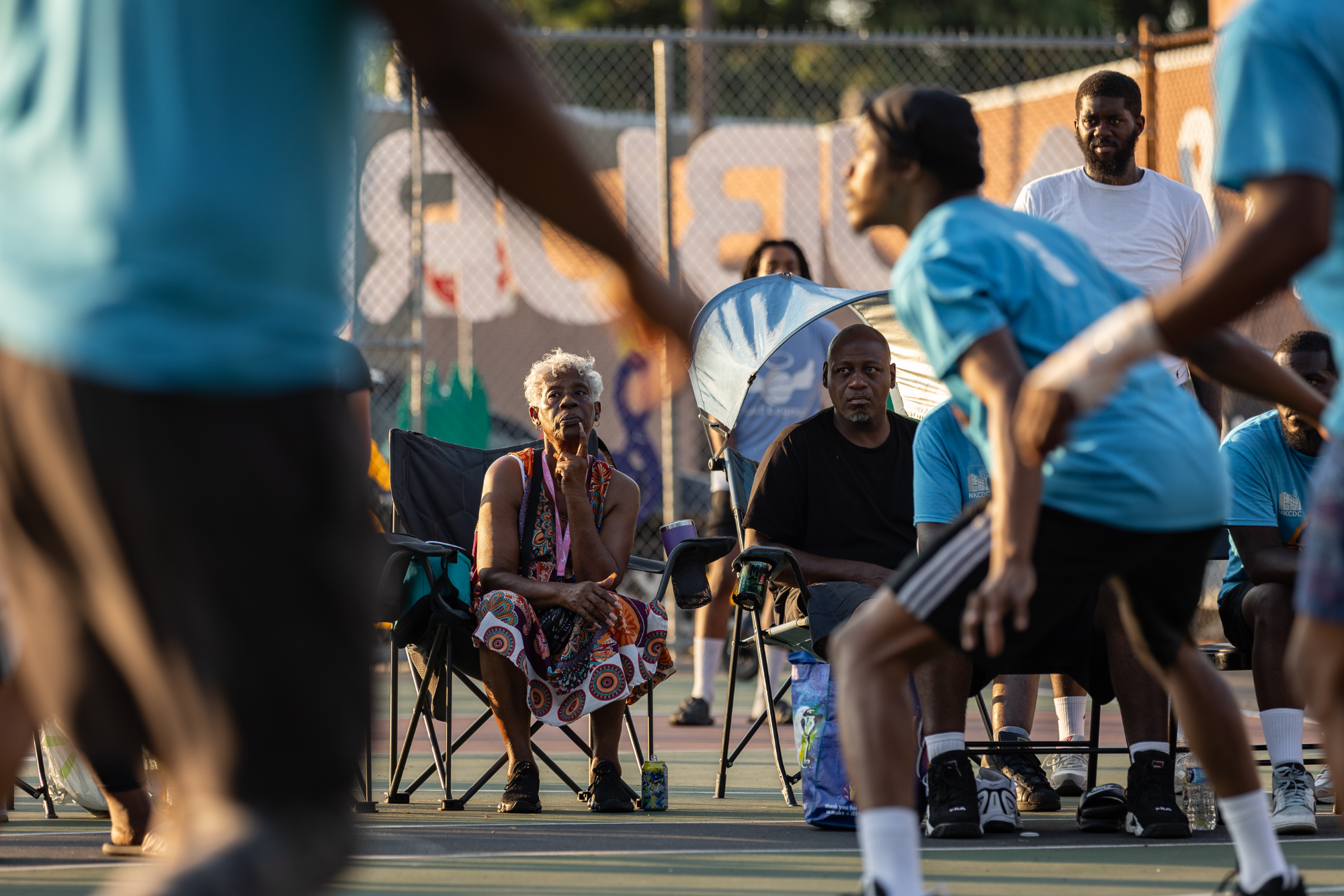 Gwendolyn Walker watches the basketball game