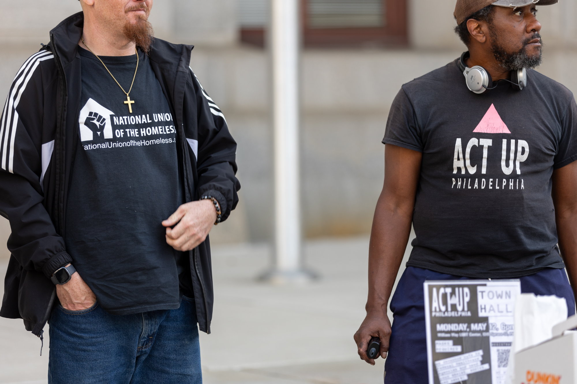 Organizers wear National Union of the Homeless and ACT UP Philadelphia shirts at Housing Now protest