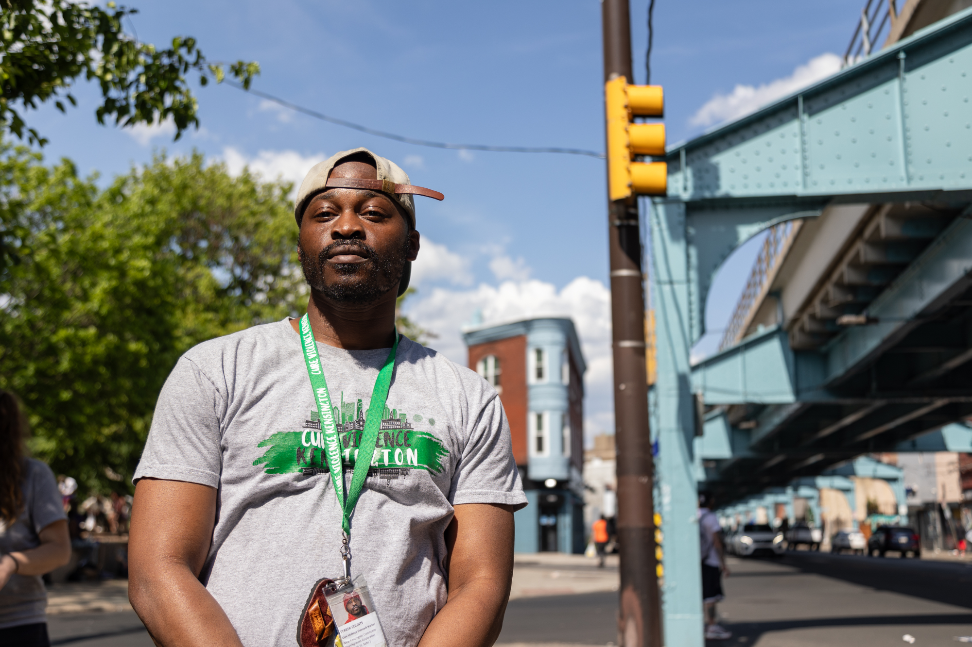 Tyreek Counts, Cure Violence Kensington program coordinator, under the el