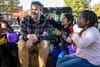 Bryan Belknap sits in a tractor pulling a hayride with families through McPherson Square Park during the fall festival on Oct. 19, 2024.